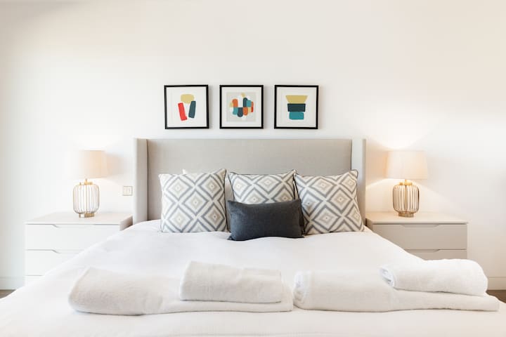 Urban Minimalist Apartment with Private Balcony