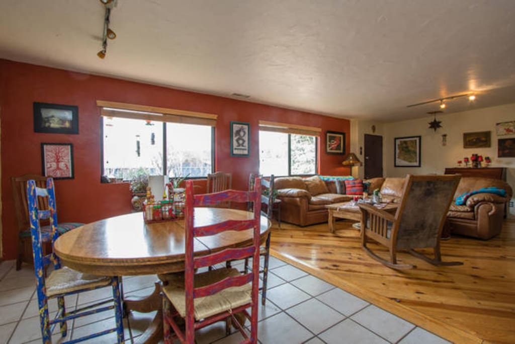 Informal dining area w/living room beyond.