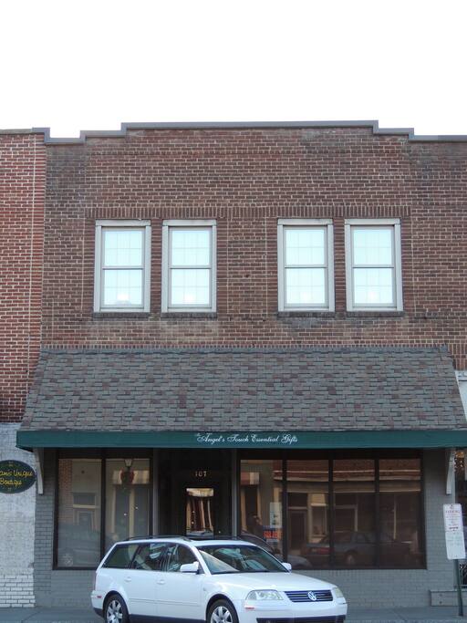 My commercial building
with apartment upstairs and retail clothing store below. 107 N Jefferson Ave