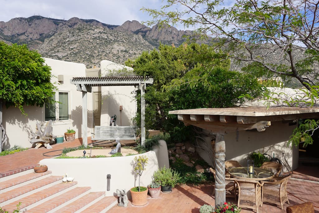 Main Home to the left and Casita to the right. Sandia mountain overhead.
