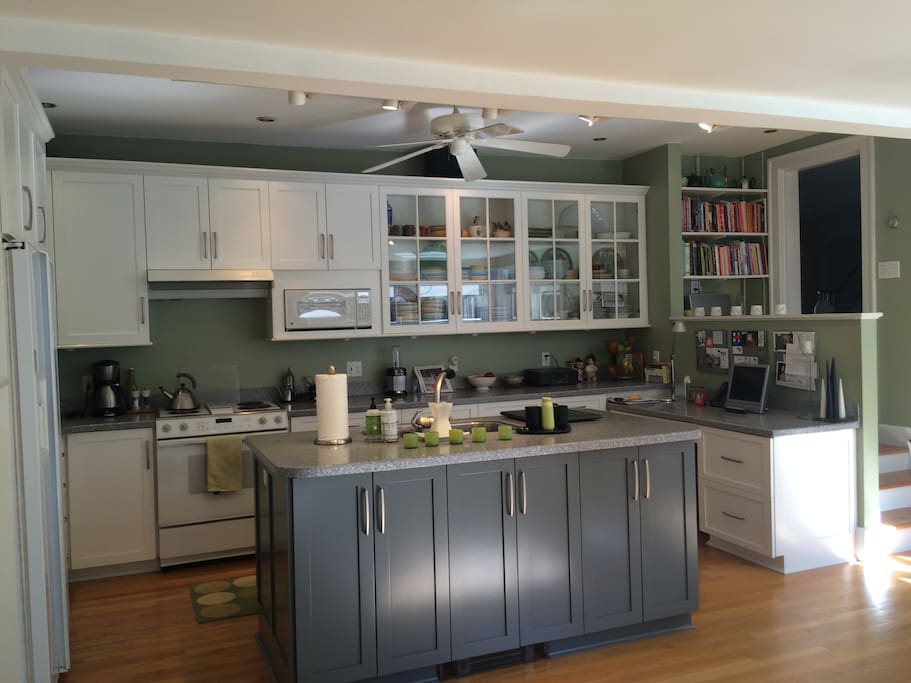 Modern gourmet kitchen with seating for 8