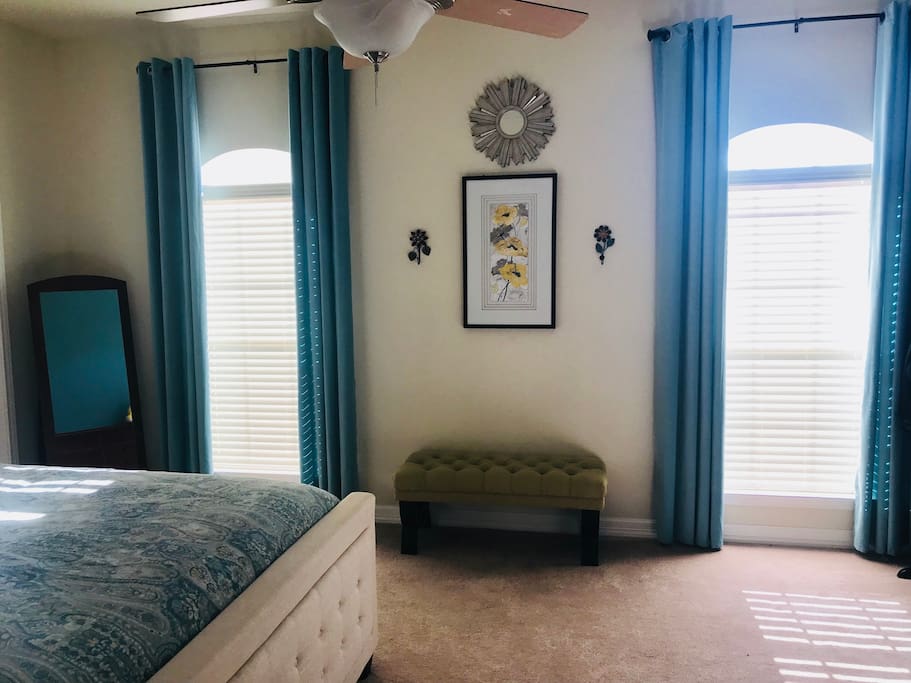 Light by day, blackout curtains by night.