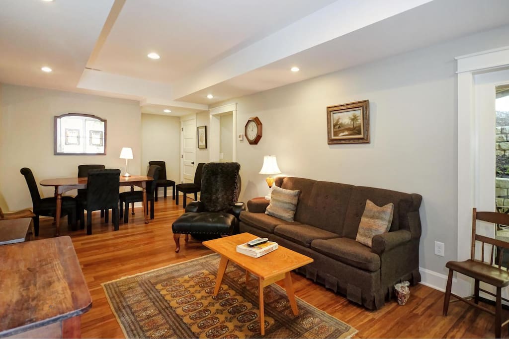 Den with TV and large table