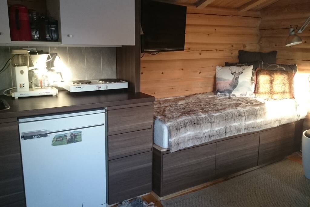 Wall mounted TV and singelbed