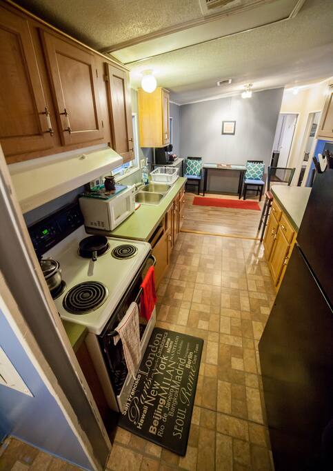 My kitchen is fully stocked with cookware and dinnerware