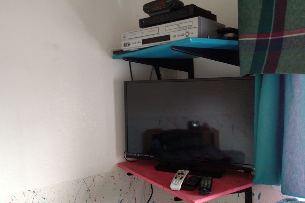 flat screen with direct TV, DVD and VCR