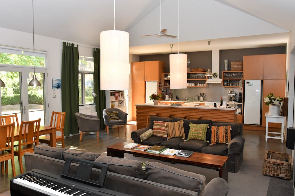 Lounge area showing kitchen in the background