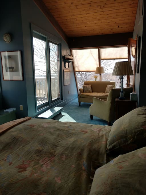 Sitting area & private deck access.