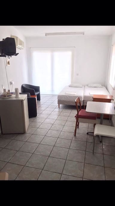 The bedroom with two single beds.
