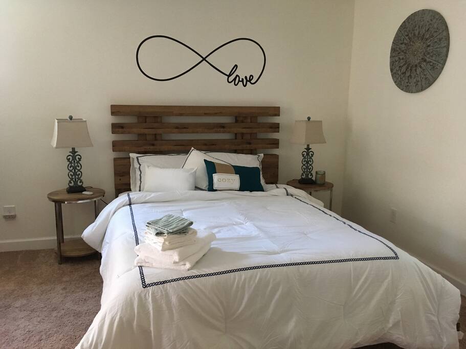 Master bedroom with ensuite bath. Cozy memory foam queen mattress.