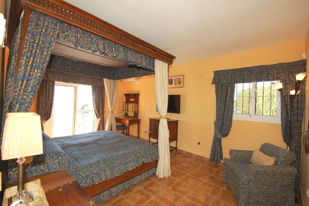 The master bedroom with Four poster bed