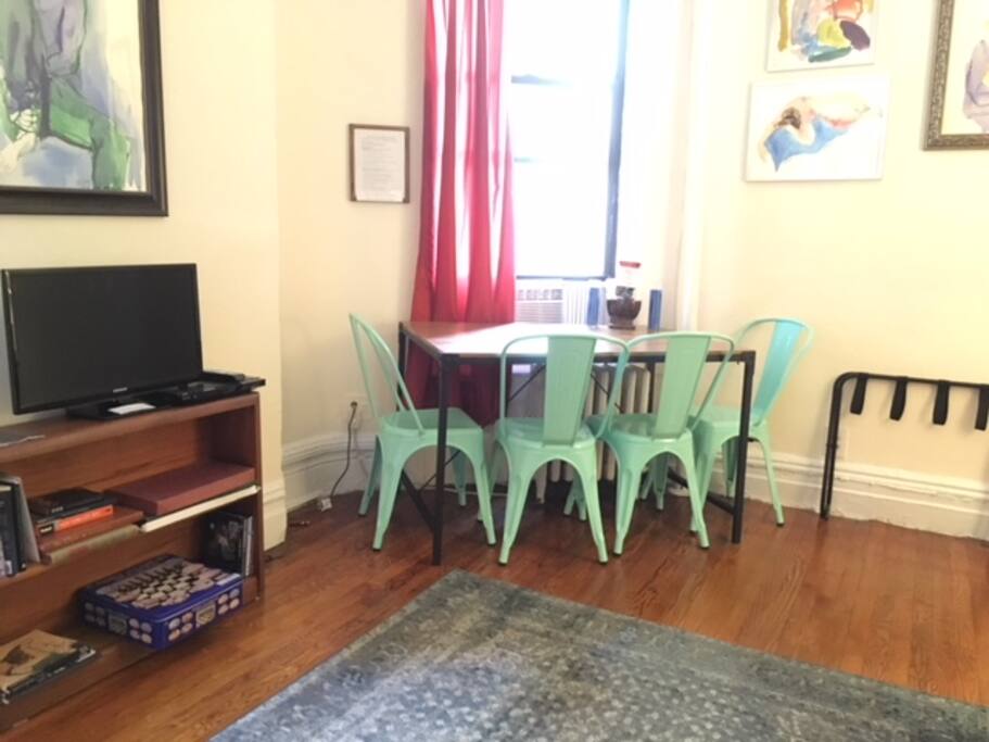 Living Room with SmartTV for streaming, games, books and dining for 4.