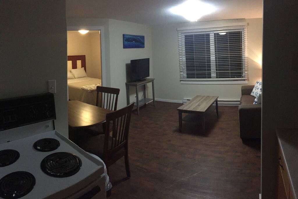 Living room, kitchen & dining table.