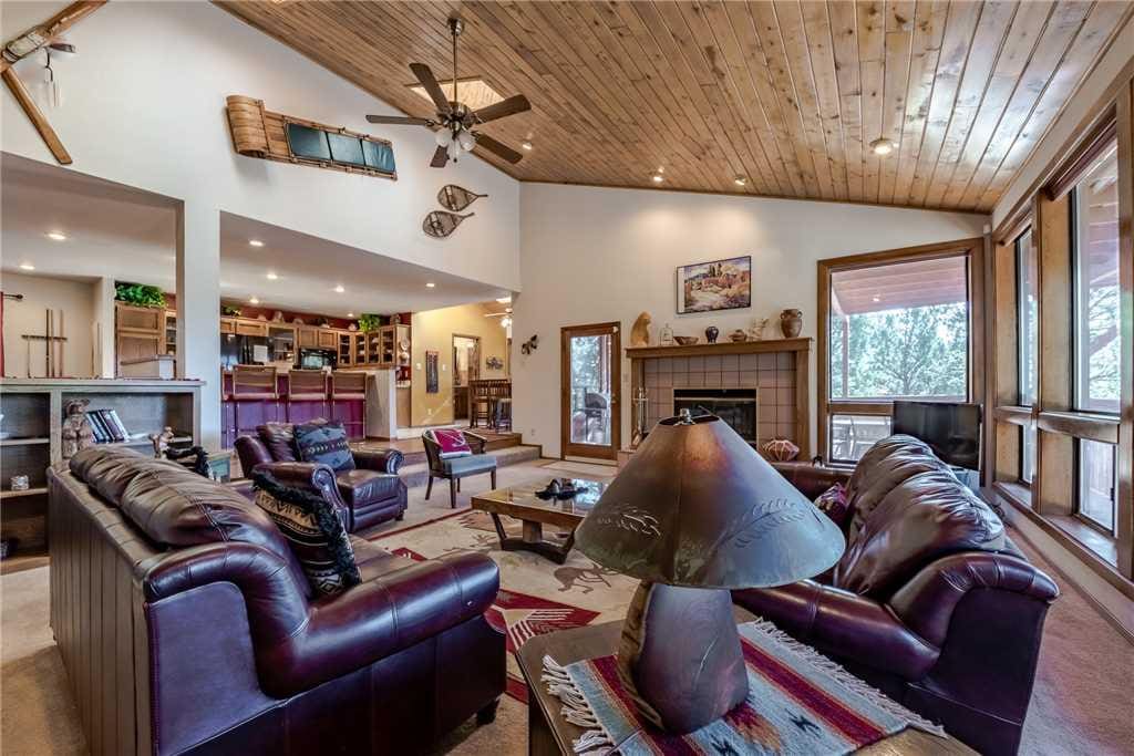 Vaulted ceilings and an open floor plan add to the ambiance of this fantastic property.