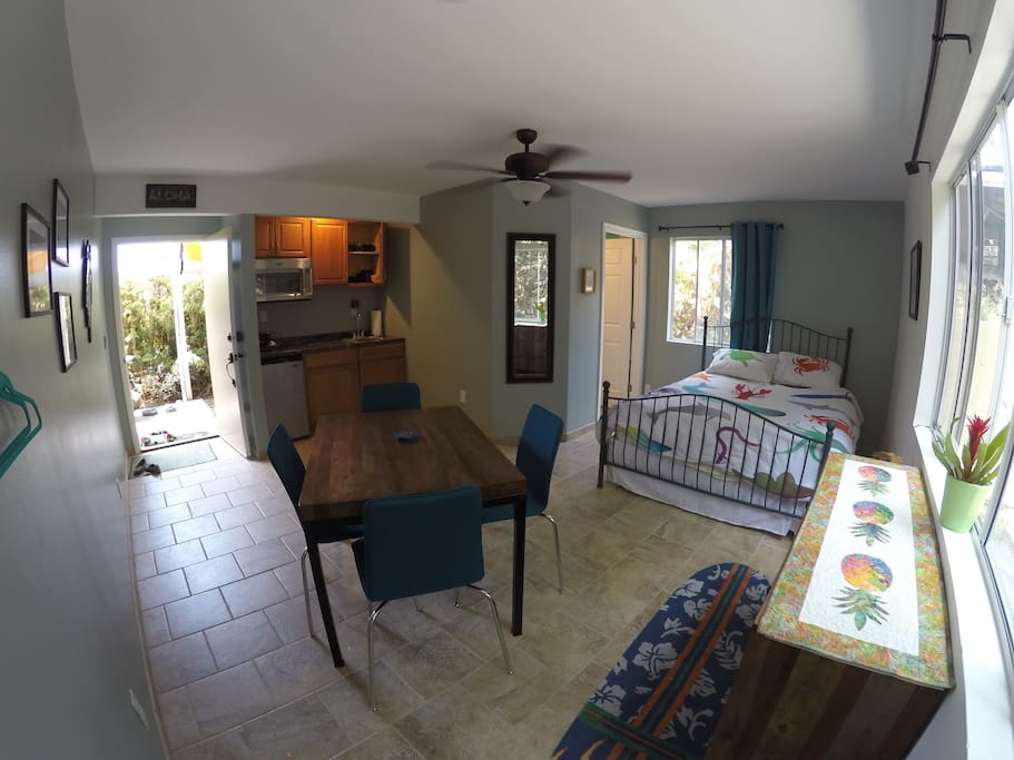 Private entrance, kitchen, dining area and bathroom door shown