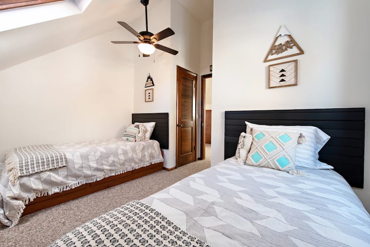 Bedroom 4:  Upper level bedroom with two (2) single / twin beds