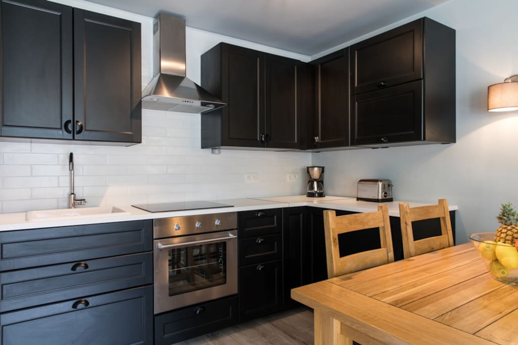 The fully equipped kitchen inthe apartment