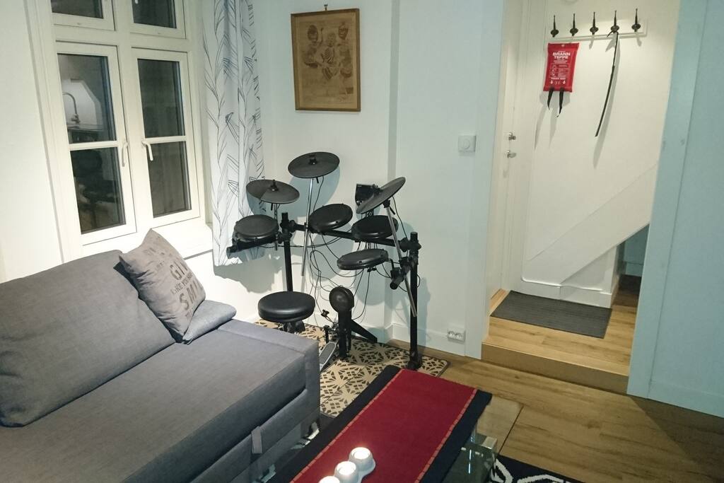 The sofa can be made into a double bed. And here you can also play a beat if you want.