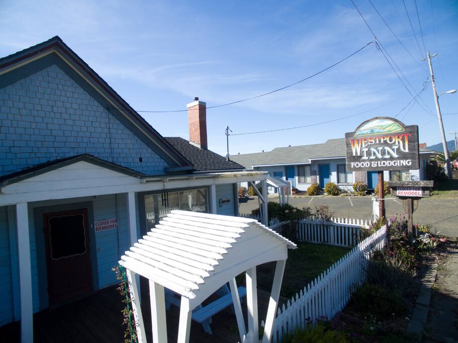 Westport Inn Bed and Breakfast. Private rooms on the right and main office/house has breakfast items like tea, coffee, croissants, muffins, etc. Short walk to the beach and amazing cliff view