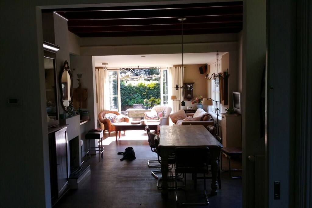 another view on ground floor with dining table and front sitting corner