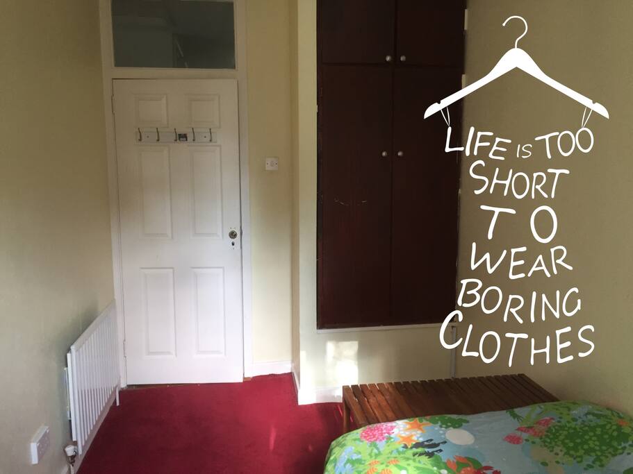 Massive wardrobe with coat rack