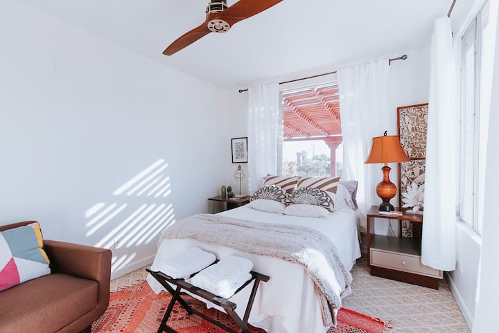 Peacock Room
Chic and peaceful with an amazing mountain view! Ceiling fan and a.c. unit for hot time of year. Heater tucked away in closet for colder season. Sleeps 2 Comfortably
