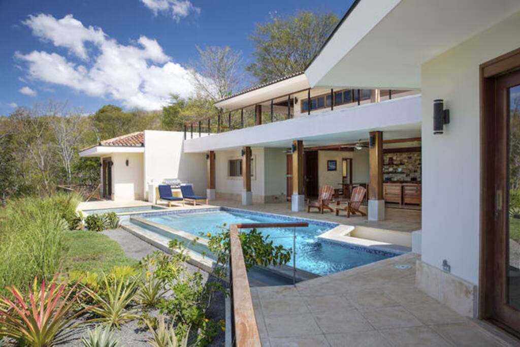 Living room and bedroom patios open to the pool and ocean view, Casa Tres Hermanos