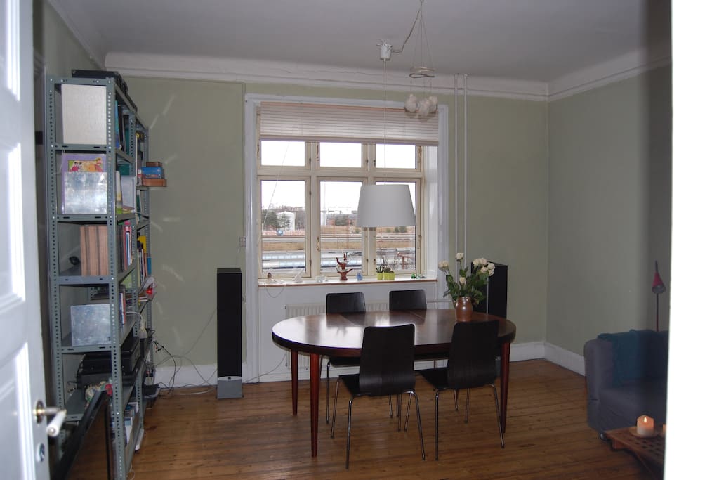 The light living room with the dining table