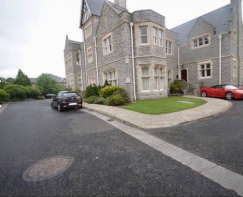 Parking within the gated complex
Apartment window overlooks gardens