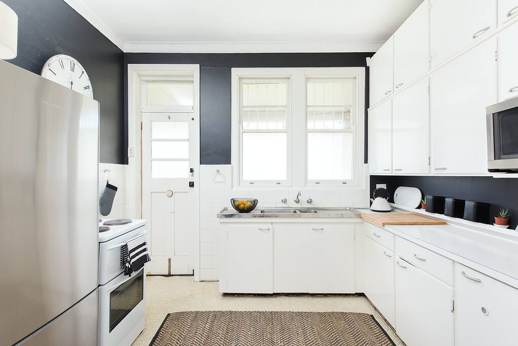Gorgeous retro kitchen has been updated to cater to modern living.