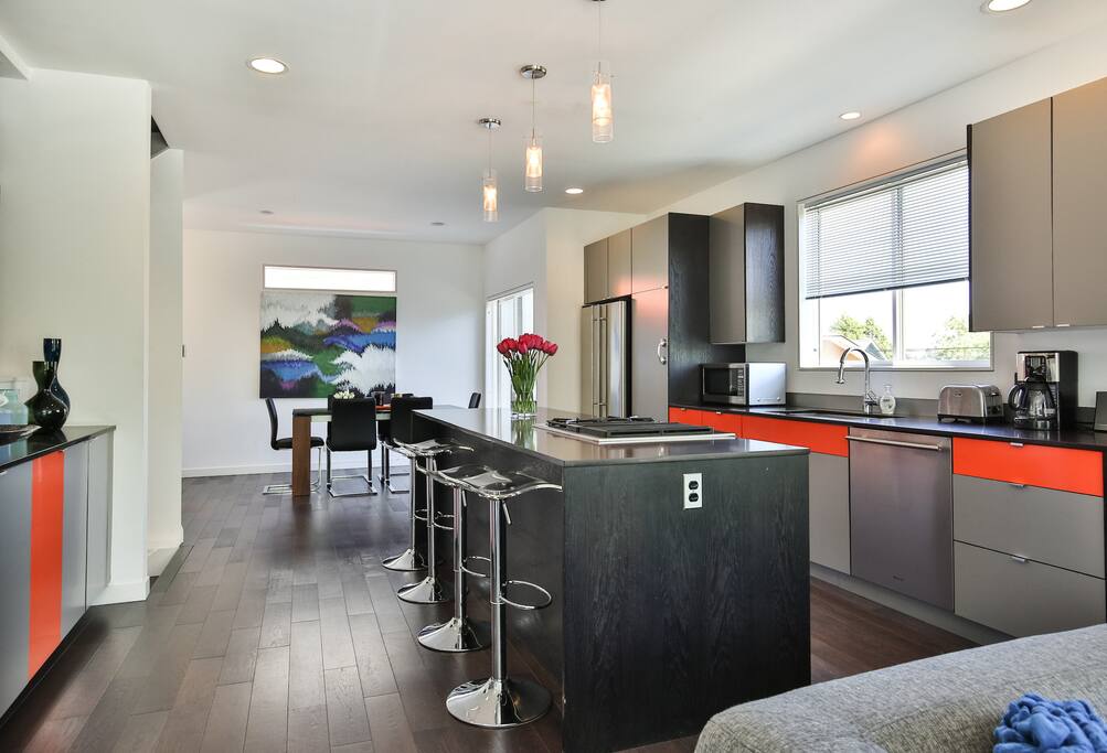 Bar stools at kitchen counter for additional dining