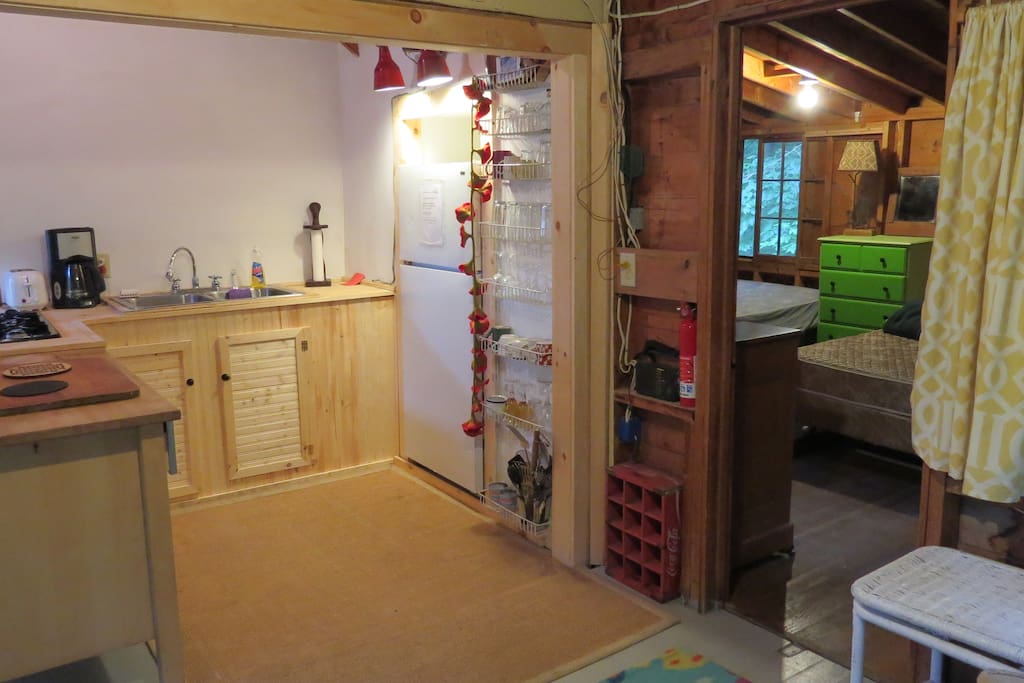 Open kitchen/living room, looking in to large bedroom