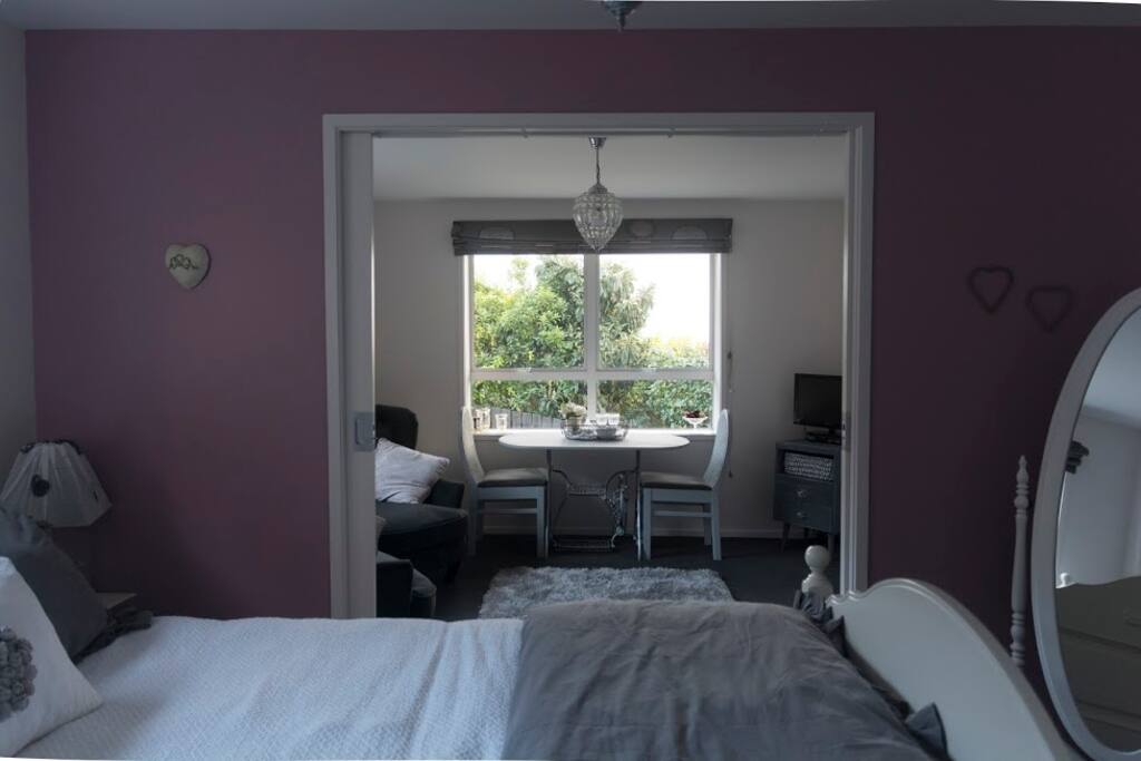 Bedroom through to lounge and dining