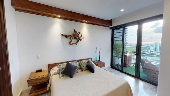 Spálňa

s terasovými dverami a výhľadom na golfové ihrisko Puerto Cancun