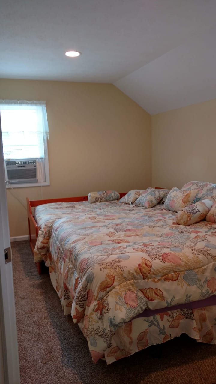 North bedroom featuring a twin and trundle bed (both twins).