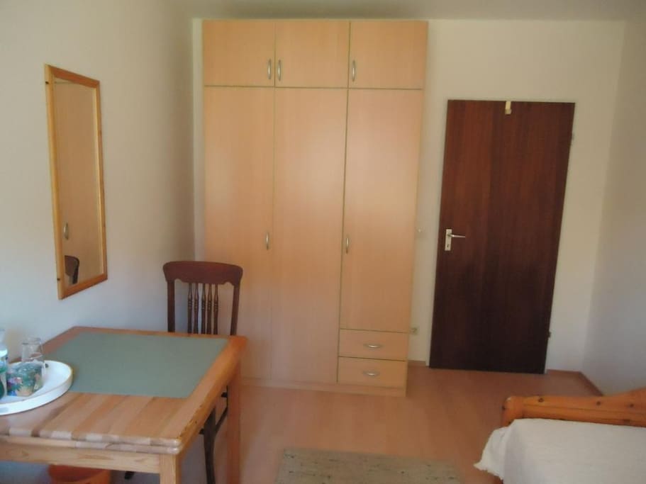 An extendable table. A large wardrobe with plenty of space.