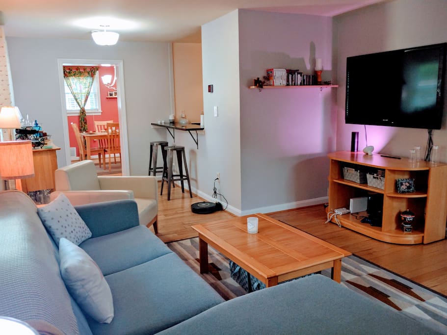 Main living room with big screen TV connected to Chromecast.