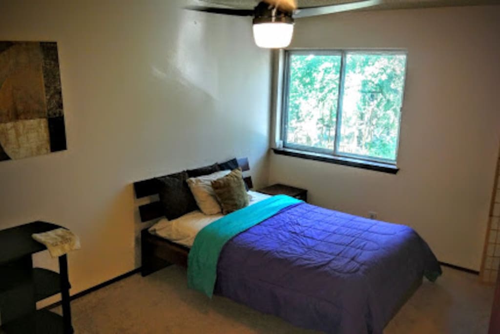 Trees out your window for shady sunny mornings or close the shade to sleep in