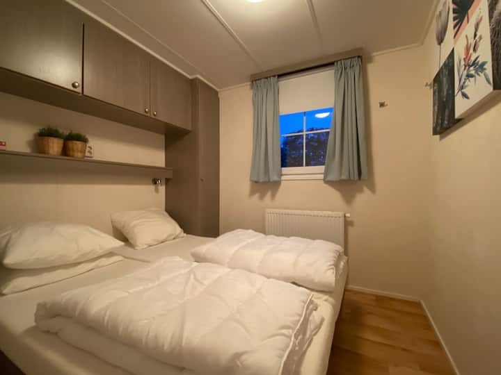 Double bedroom with closets (hanging/laying) All the bedrooms have roller blinds and blackout curtains.