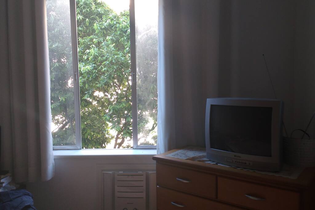Nice view to a tree through bedroom's window.