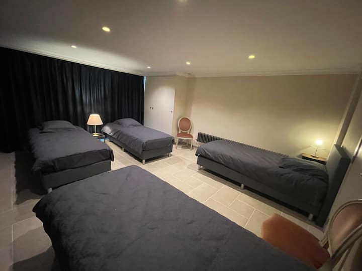 Bedroom 4 on the ground floor. 4 single beds. 
