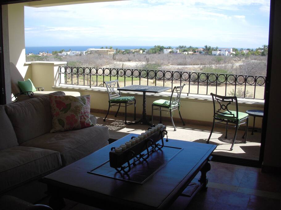 Living area with 17 foot wide pocket doors to terrace