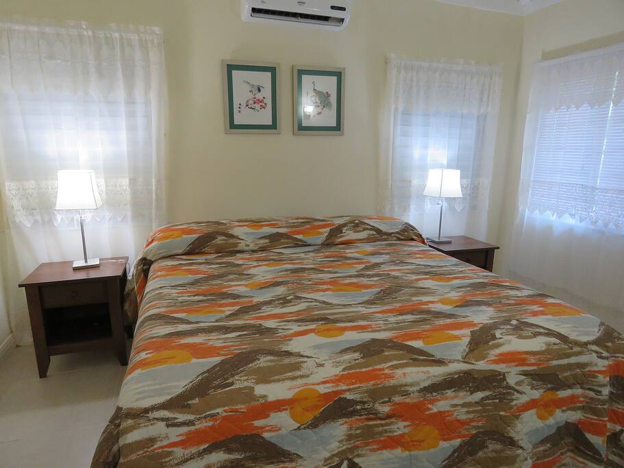 Master bedroom king sized bed, beautifully done