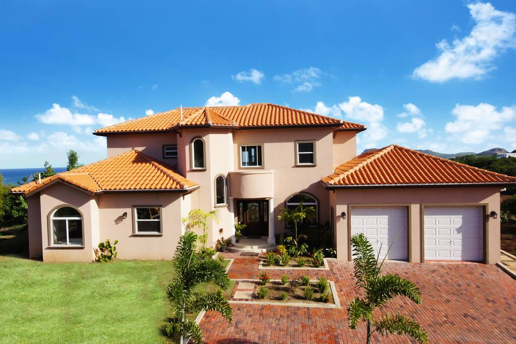 Entrance into Villa, driveway & garage