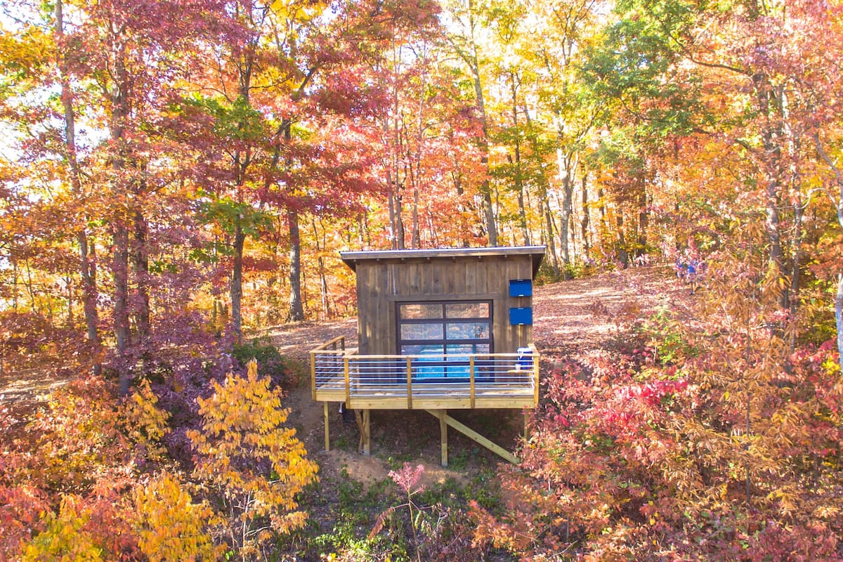 Airbnb in Asheville surrounded by fall foliage