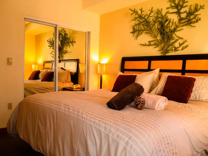 King-sized bed with pillow top mattress and 1,200 thread-count sheets