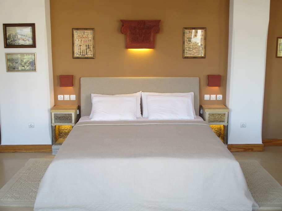 Brand new bed and mattress with custom ceramic lighting.