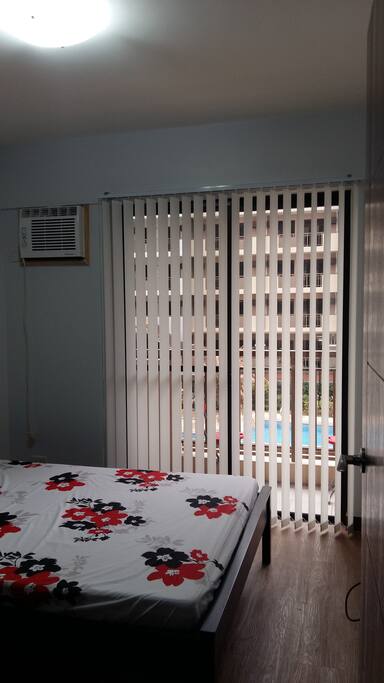 Masters Bedroom with balcony , sliding door , facing swimming pool