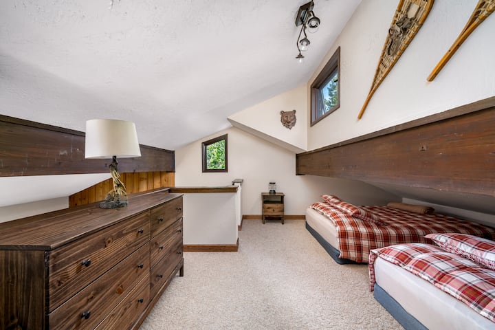 The loft is open to and overlooks the living area, allowing kids to enjoy their own space - and Netflix on their own HDTV - without being out of earshot of parents.