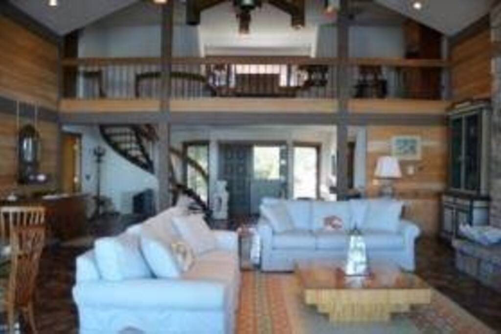 Great room with loft and spiral staircase